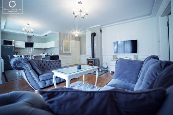 Zdjęcie przedstawia sofa | apartament Górski Widok w Górskich Domkach. Karkonosze