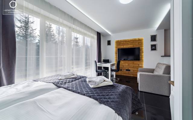 Apartament Górski Widok w Górskich Domkach w Karpaczu - zdjęcie łoża małżeńskiego