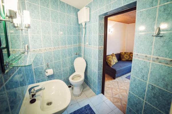 Zdjęcie przedstawia łazienkę w pokoju Dom Gościnny DOROTA
