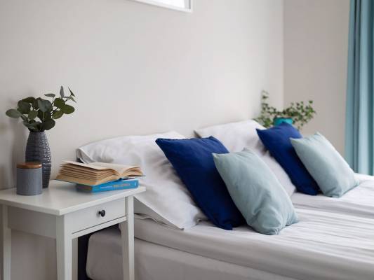 Fotografia przedstawia łóżko w pokoju - Apartament Szafirkowy | Kudowa-Zdrój (wypoczywaj w górach) 