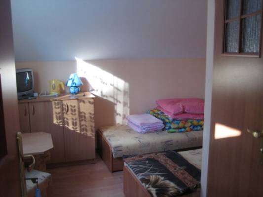 Zdjęcie przedstawia spanie w pokoju - U JANINY | Pobierowo (wypoczywaj nad morzem) 