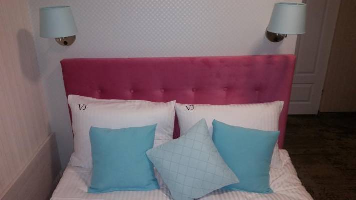 Fotografia przedstawia łóżko w pokoju - Villa JUSTYNA | Pobierowo (wypoczywaj nad morzem) 