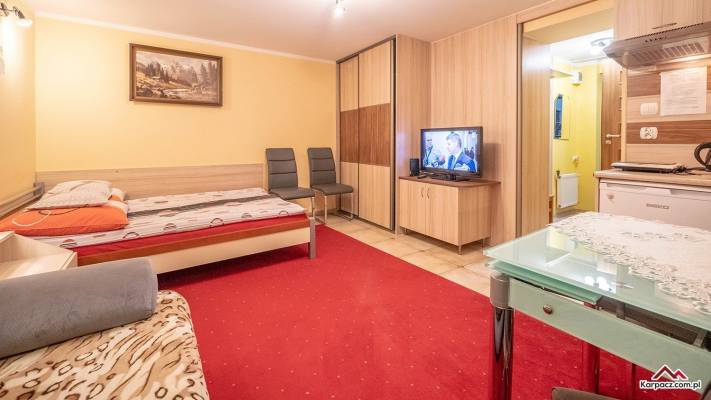 Na fotografii przedstawiony jest pokój w pokoju U PREZESA Pod Śnieżką w którym możecie Państwo się zatrzymać podczas pobytu w Karpaczu