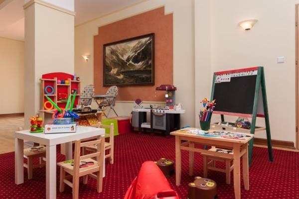 Zdjęcie ma na celu pokazanie możliwości, jakie przed dziećmi otwierają się w pokoju zabaw - resort Bałtyk w Rewalu.