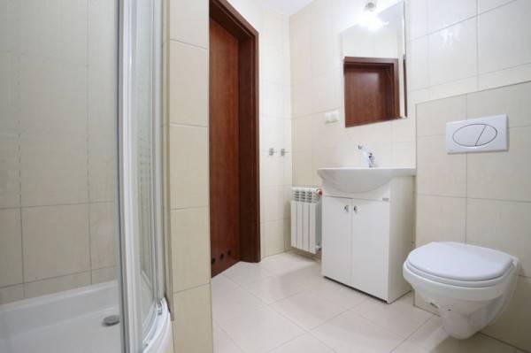 Widok na łazienkę w pokoju MORSKA FALA pokoje apartamenty domki w Pobierowie nad morzem