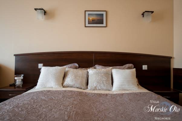 Pensjonat Villa MORSKIE OKO w Niechorzu - zdjęcie łóżka małżeńskiego